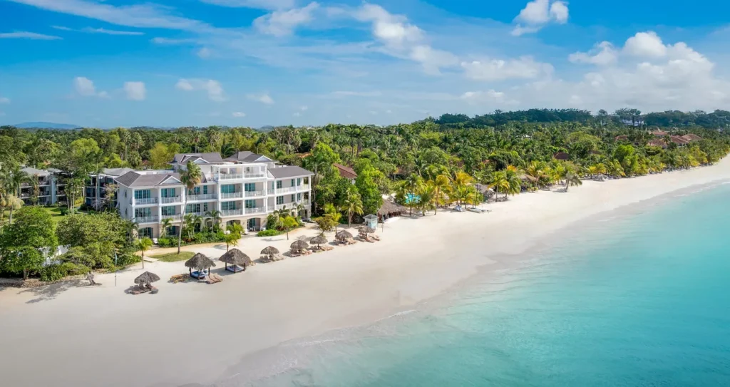 Beachfront buildings and white sand at Beaches Negril