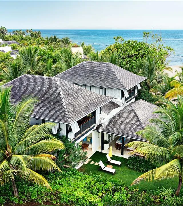 Half Moon accommodation surrounded by tropical gardens