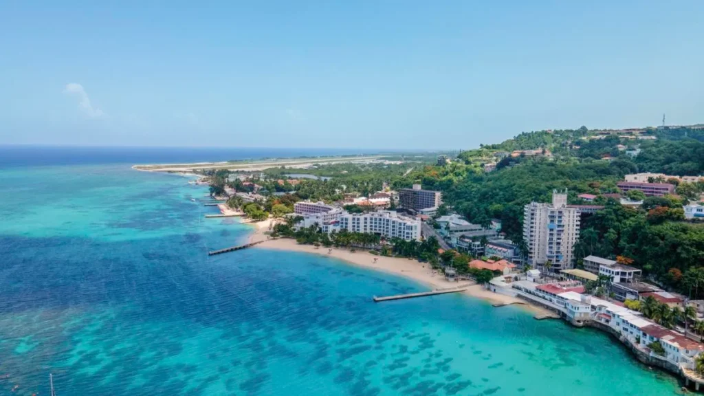 Turquoise coastline and beachfront buildings in Montego Bay