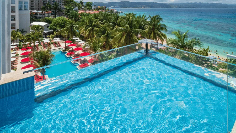 Elevated pool overlooking the sea at S Hotel Montego Bay