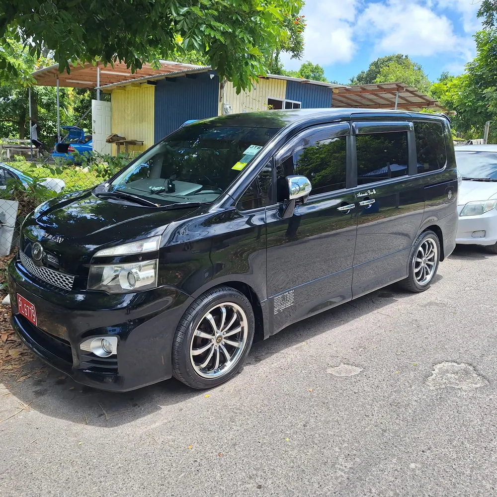 TedTours black Toyota Voxy minivan