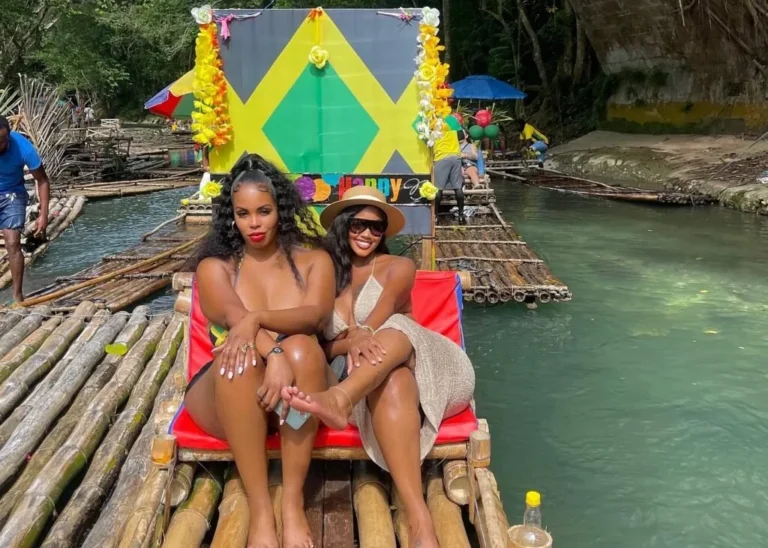 Guests on a bamboo raft on the Great River in Lethe, Jamaica