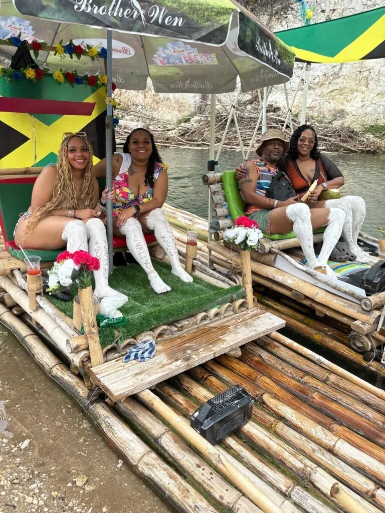 Bamboo rafts and guests at the Lethe rafting riverbank